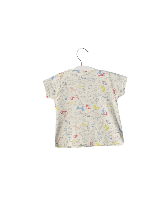 A White Pyjama Sets from Petit Bateau in size 6-12M for boy. 