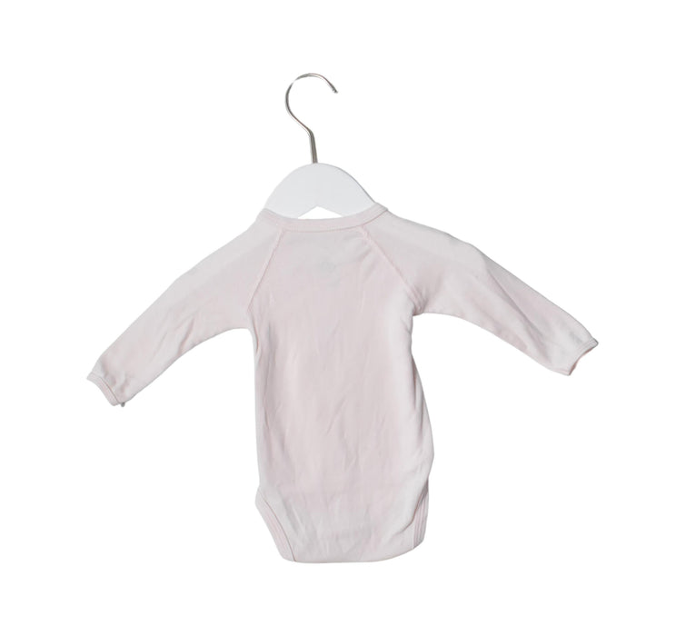 A Pink Long Sleeve Bodysuits from Petit Bateau in size 3-6M for girl. (Front View)
