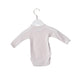 A Pink Long Sleeve Bodysuits from Petit Bateau in size 3-6M for girl. (Front View)