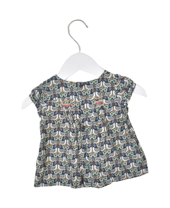A Black Sleeveless Tops from Bonpoint in size 6-12M for girl. (Back View)