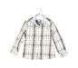 A White Shirts from Timberland in size 4T for boy. (Front View)