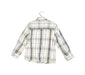 A White Shirts from Timberland in size 4T for boy. (Back View)