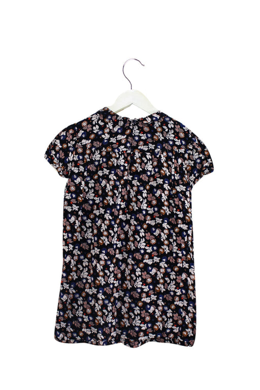 A Navy Short Sleeve Dresses from Bonpoint in size 6T for girl. (Front View)