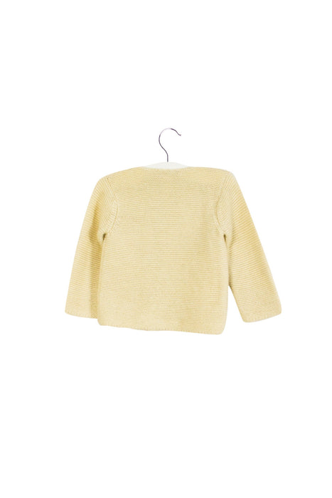 A Ivory Cardigans from Bonpoint in size 6-12M for girl. (Back View)
