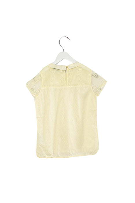A Ivory Short Sleeve Tops from Tommy Hilfiger in size 10Y for girl. (Back View)