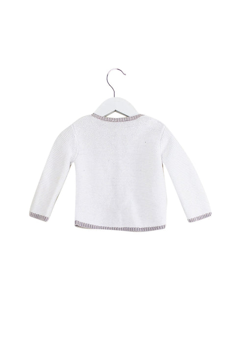 A White Cardigans from Jacadi in size 6-12M for girl. (Front View)