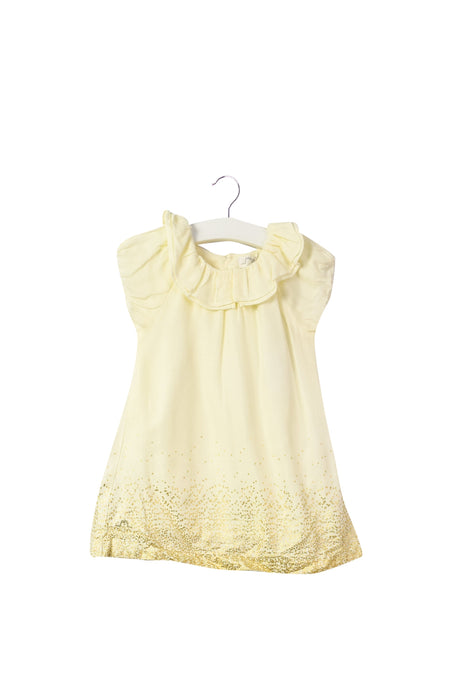 A Ivory Bloomers from Chateau de Sable in size 3-6M for girl. 