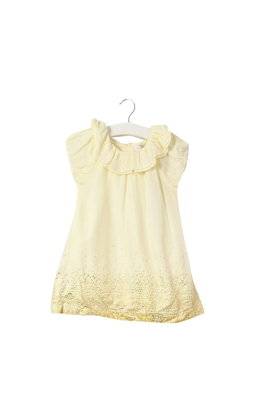 A Ivory Bloomers from Chateau de Sable in size 3-6M for girl. 