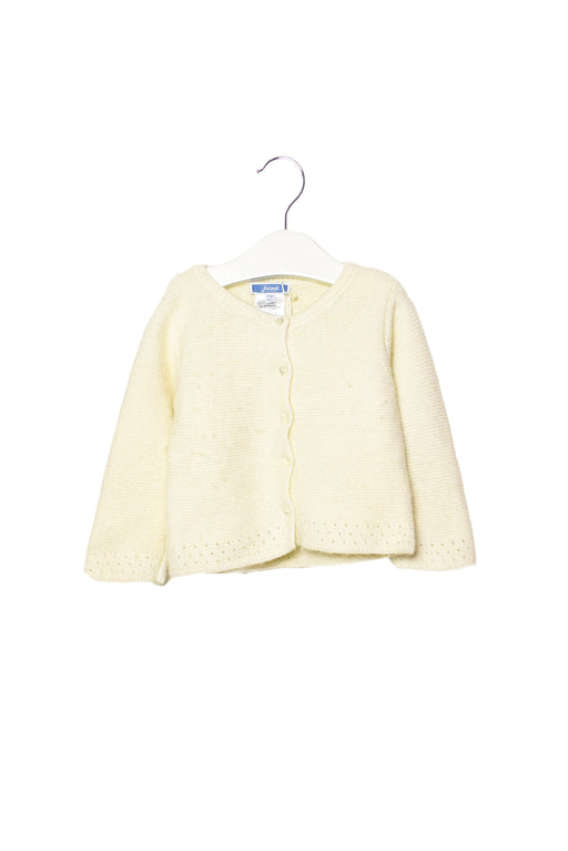 A White Cardigans from Jacadi in size 6-12M for girl. (Back View)