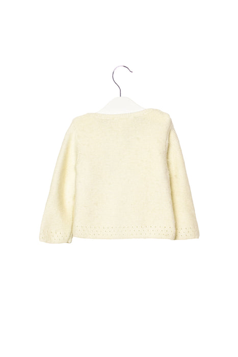 A White Cardigans from Jacadi in size 6-12M for girl. (Front View)