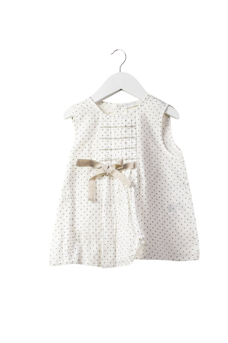A White Sleeveless Tops from Laranjinha in size 4T for girl. (Front View)