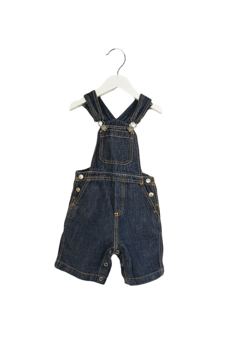 A Blue Overall Shorts from Petit Bateau in size 6-12M for boy. (Back View)
