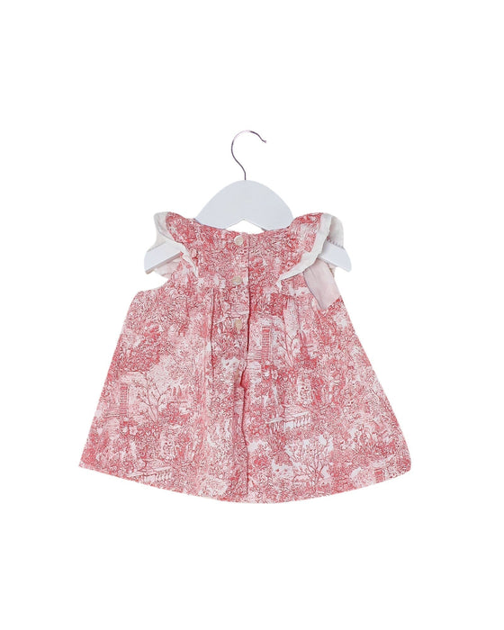 A Pink Sleeveless Dresses from Nanos in size 3-6M for girl. (Back View)