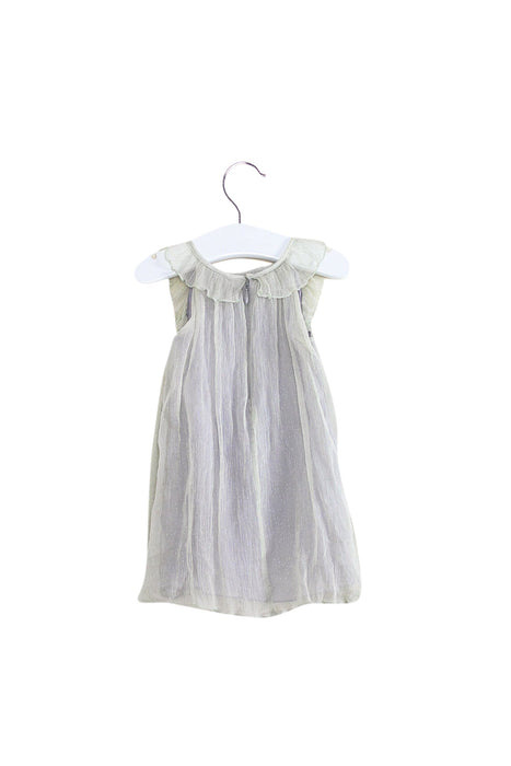 A Green Sleeveless Dresses from Seed in size 3-6M for girl. (Back View)
