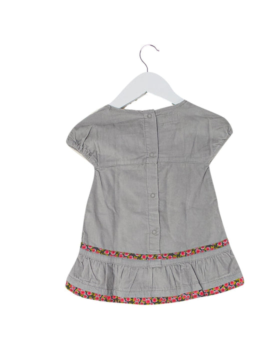 A Grey Short Sleeve Dresses from Petits in size 3-6M for girl. (Back View)