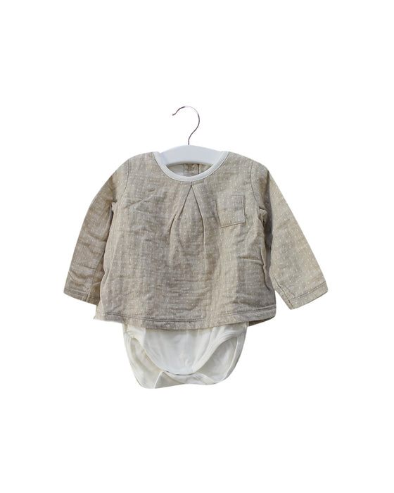 A Taupe Long Sleeve Bodysuits from Petit Bateau in size 6-12M for girl. (Back View)
