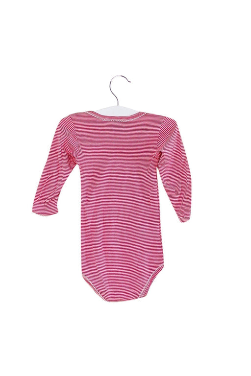 A Pink Long Sleeve Bodysuits from Petit Bateau in size 6-12M for girl. (Front View)